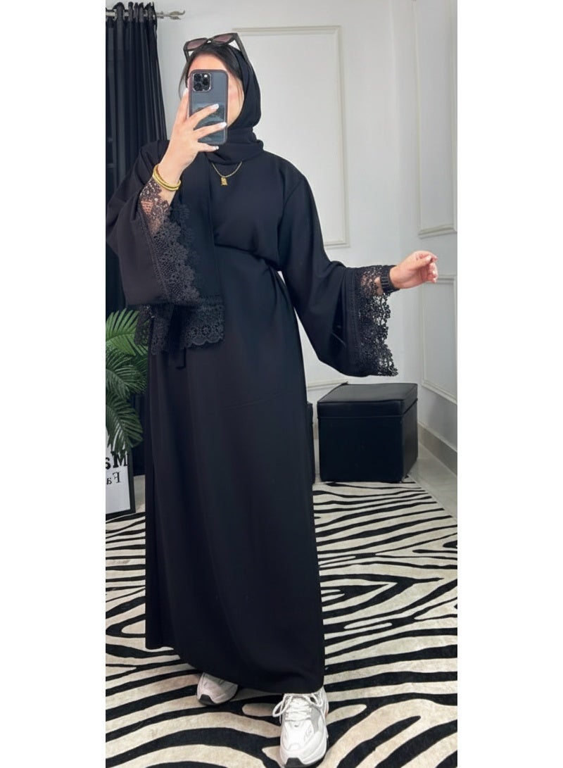 Elegant black women's abaya with luxurious lace sleeves, featuring a modern, wide design and sophisticated look perfect for special occasions and everyday outings. Add a touch of glamour and elegance to your look. Code 4040 - Image 1